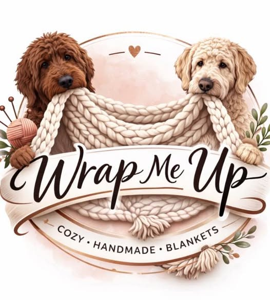 Wrap Me Up: two dogs holding a blanket
